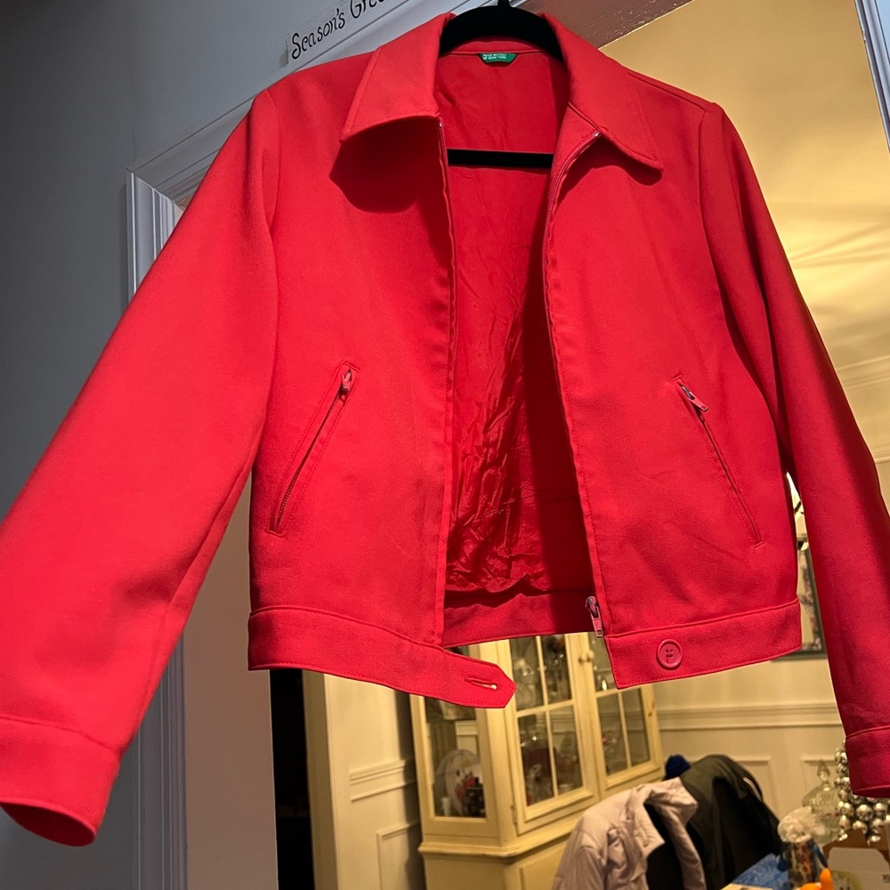 Red/coral jacket made in Italy shown on a size small